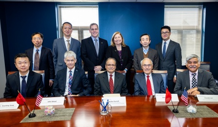 UB officials sign agreement with Dalian University, China. 