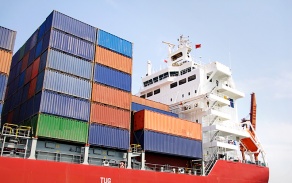 modern container ship with containers stacked on it. 