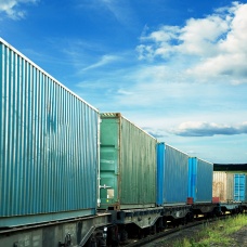 A line of railroad freight cars. 