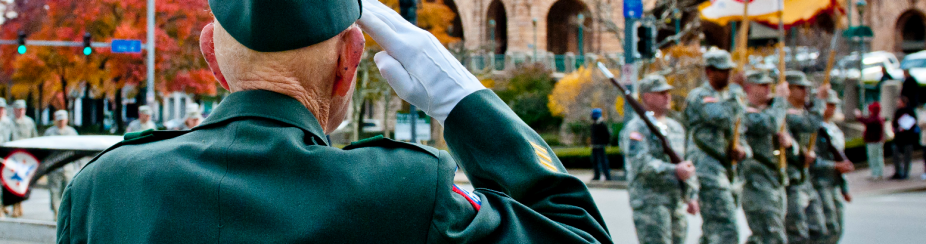 Veteran salutes other service members. 
