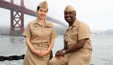 Nancy Mautone-Smith and Torris Smith pose in uniform. 
