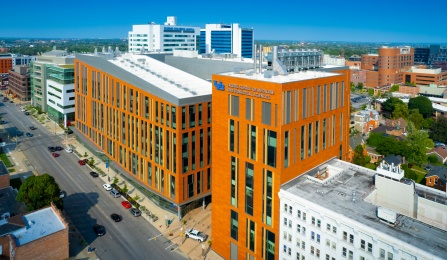 Aerial image of the exterior of the Medical School Building, home of the Jacobs School of Medicine and Biomedical Sciences, in downtown Buffalo, NY photographed in August 2021. 