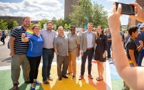 Members of the LGBTQ Faculty and Staff Association Steering Committee — from left, Dylan Steed, Kelly Cruttenden, Jim Bowman, Javier Bustillos, Naciah Bell, Ben Fabian and Jessica DiPasquale — pose for a photo. 
