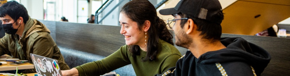 Students studying in One World Cafe. 