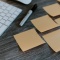 Post-it notes arranged on a desk. 