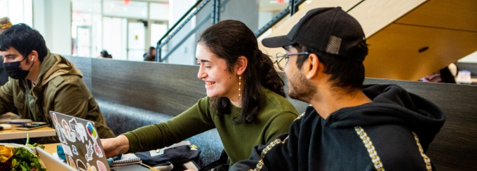 Students studying in One World Cafe. 