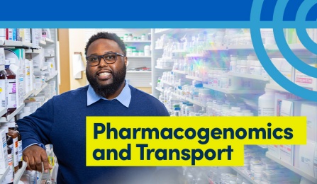 Person standing in pharmacy leaning on shelf. 