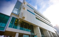 Photo of the outside of the New York State Center of Excellence in Bioinformatics Life Sciences Building. 