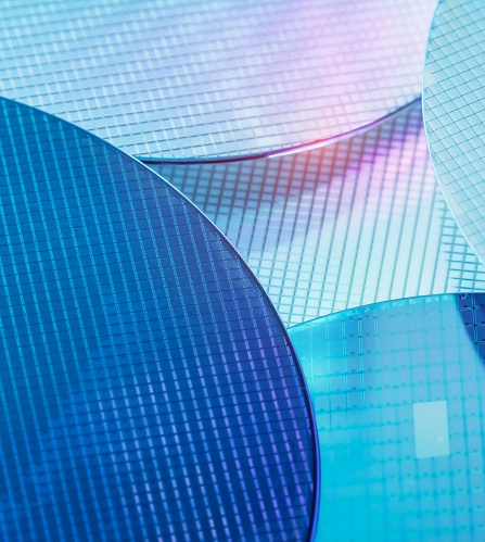 Macro of silicon wafer semiconductor with neon color, integrated circuits to manufacture CPU and GPU. 