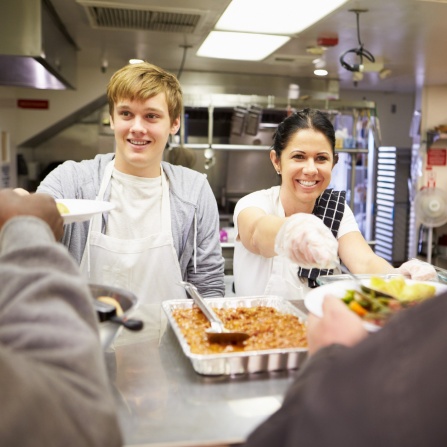 Royalty-free stock photo ID: 1212195550 Smiling african manager coach speaking at diverse corporate group meeting, female black teacher team leader talking to office workers at training teaching employees explaining new idea, mentoring. 