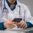 AI, healthcare doctor uses a mobile smartphone app to manage data and EHR for telemedicine and faster diagnostics, ensuring secure digital patient care and efficient clinical decisions. 