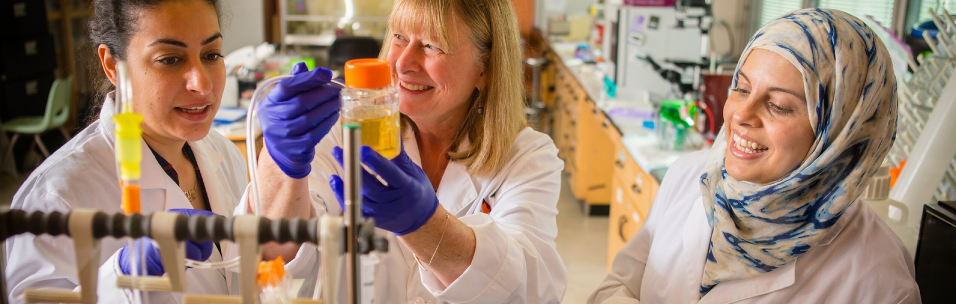 Cancer research company, For Robin, with founder Rittenhouse-Olsen in her Sherman Hall lab. 