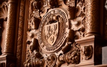 UB seal above fireplace in Abbott Hall. 