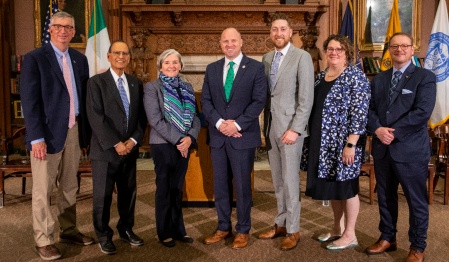 From left to right: Provost A. Scott Weber, President Satish K. Tripathi, Bonnie Kane Lockwood, WNY regional director for Gov. Kathy Hochul, NYS Senator Tim Kennedy, Dermot Fitzpatrick, vice consul general of Ireland in New York, Evviva Weinraub Lajoie, vice provost for University Libraries, and James Maynard, UB Libraries Poetry Collection curator. Photo: Meredith Forrest Kulwicki. 