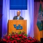 President Tripathi speaks at a podium at his annual State of the University address. 