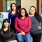 four students posing. 