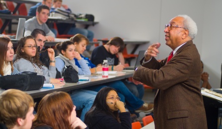 Albert Price, a faculty member in the Department of Urban and Regional Planning, teaches a World Civilization class in Knox Lecture Hall. 