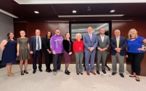 A group picture of 2025 award recipients, flanked by PSS Chair and Vice Chair. 