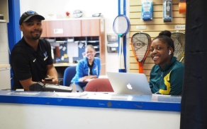 Associate Director for Facilities & Operations, Dior Jackson, working alongside a student employee. 