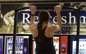 A UB student completes a pull-up during the HardCORE Challenge. 