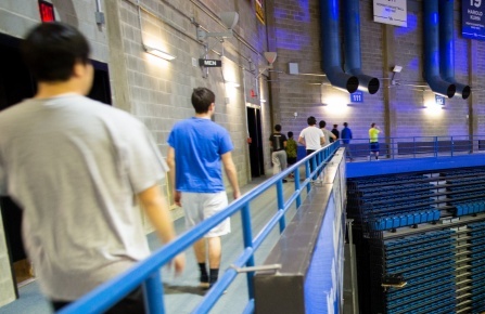 people walking on the indoor jogging track.