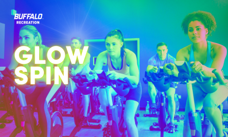 students participating in spin class with trippy overlay of "GLOW SPIN". 