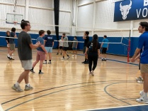 students playing volleyball. 
