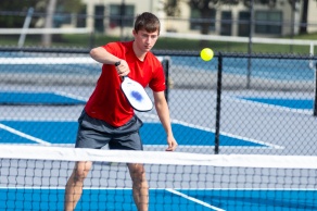 UB Student playing pickleball. 