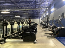 Broadview Arena’s elevated cardio deck featuring rows of ellipticals, treadmills, stationary bikes and other exercise equipment.