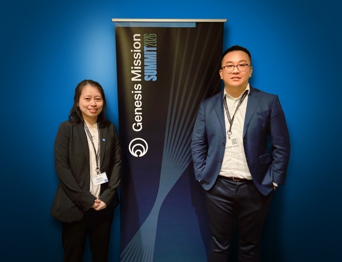 Yinyin Ye, left, and Jiayu Peng at the Genesis Mission summit. 