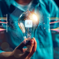 Person holding a lightbulb with AI icon emitting colorful digital swirls. AI innovation concept. 