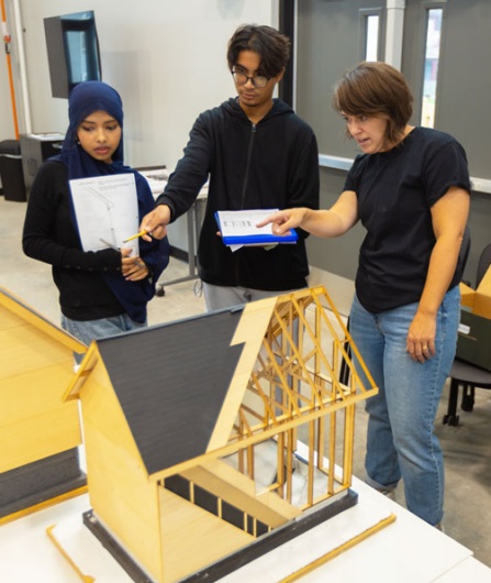 Students work at the Sustainability Workforce Training Center at PUSH Buffalo, in Buffalo, NY in August 2024. Nicholas Rajkovich, from the School of Architecture and Planning, organized the effort. Photographer: Douglas Levere. 