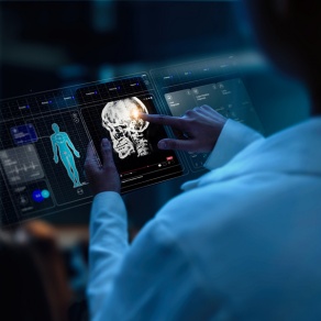 Physicians reviewing electronic medical records and test results on AI generated display.