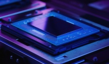 Upclose image of computer chip with purple hue. 
