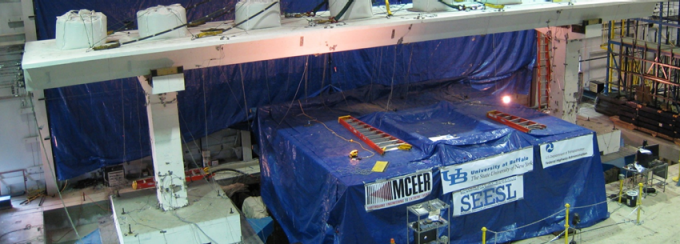 Test specimen on shake table with extension. 