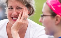 student talking with a mature adult. 