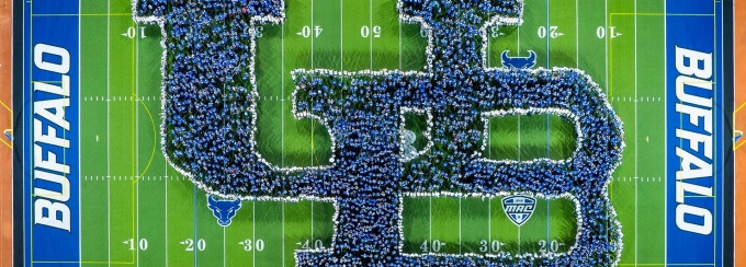 UB's Class of 2026 forms a human interlocking UB symbol. 