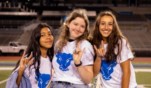 Students gather for the New Student Welcome event at the UB Stadium in August 2022. They walked on the field to form the interlocking UB. Photographer: Meredith Forrest Kulwicki. 
