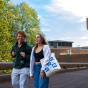 campus residents walking on the ellicott terrace. 