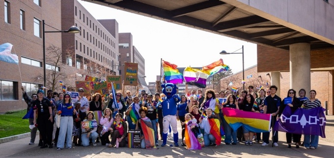 The Intercultural and Diversity Center celebrated Pride Week with a variety of activities and events, including the Pride March through North Campus in April 2024. Participants walked about the Spine and enjoyed a social event in the Knox Quad. \n\nPhotographer: Meredith Forrest Kulwicki.