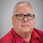 Headshot for John Kisker. 