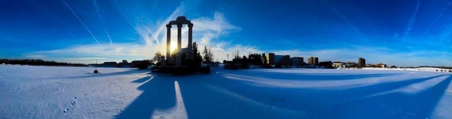 The sunrise behind Baird Point, photographed in February 2022. Photographer: Douglas Levere. 