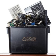 electronic items in recycling bin. 