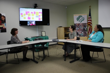 Girl Scouts of Western New York employees at a meeting.