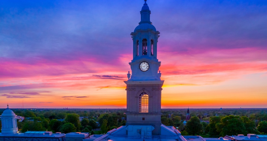 An sunset view of Hayes Hall clock tower on UB's South Campus. 