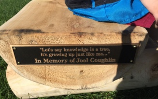 Plaque and quote on Joel's bench. 