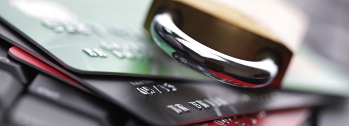 graphic of credit card with padlock. 
