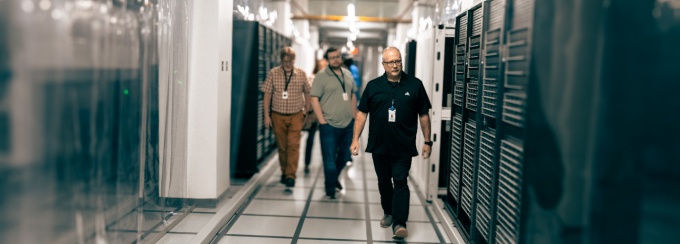 Partnership: UBIT staff visit the facility housing BullsAI’s high-performance computing infrastructure. Developed in collaboration with UB’s Department of AI and Society, the platform brings together technology and academic expertise to support secure AI research, teaching and innovation. Photo: Dennis Reed Jr. 