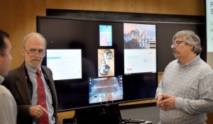 Zoom image: James Whitlock and John Pfeffer from UBIT Customer Service demonstrate screencasting technology for the classroom. 