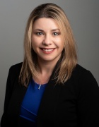 Professional photograph of Kelly Duran, Assistant Vice President and Director of Strategic Portfolio Management. 